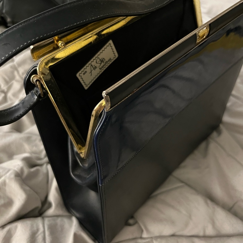 Elegant Black and Gold Handbag